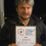 Piotr Zarebski z nagroda za Wiezniarki